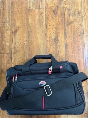 American Tourister Black Travel Duffel with Red Accents